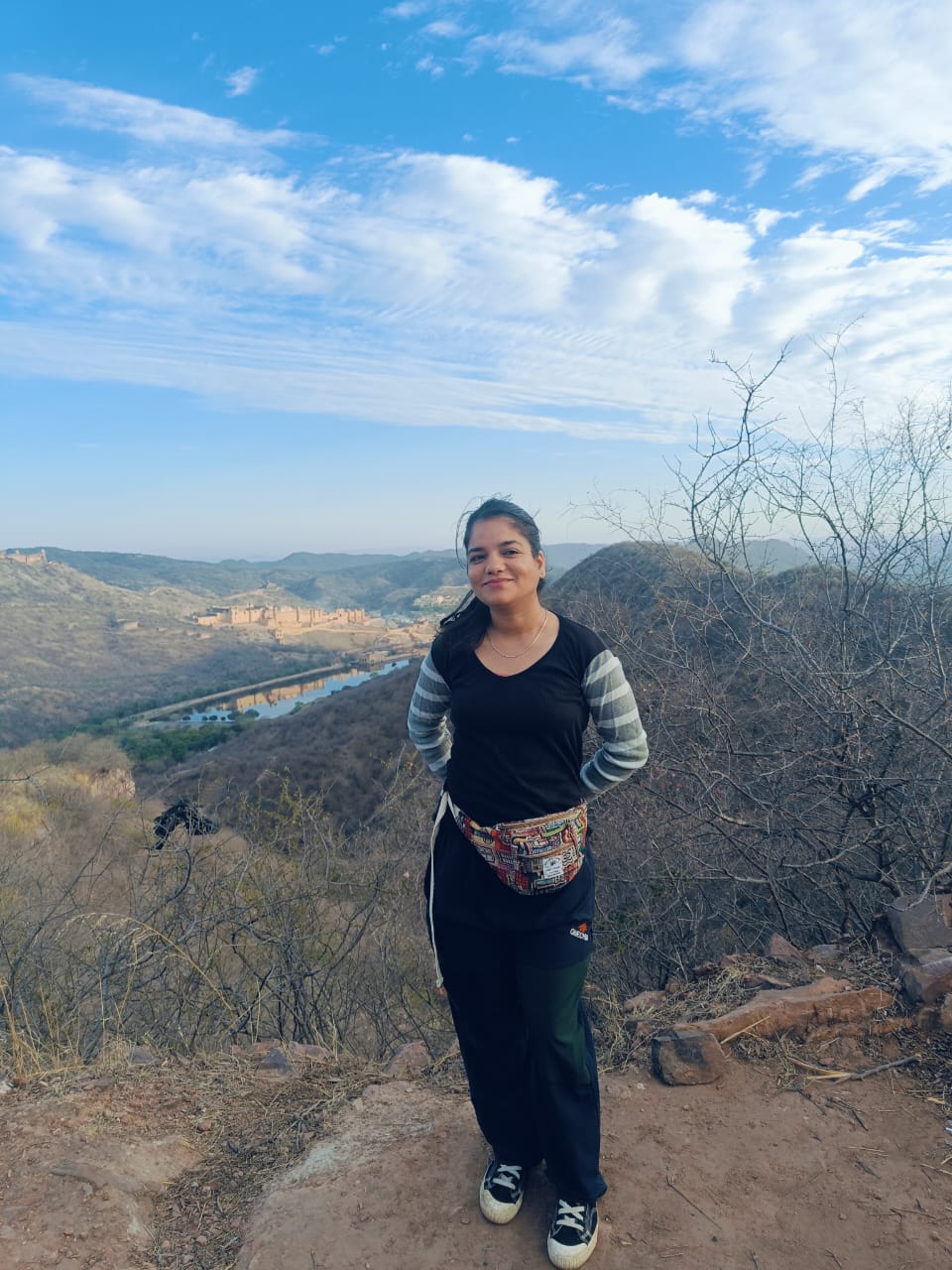 Lavina Korani, founder of Tripperfly, on a ridge above Amer Fort, Jaipur